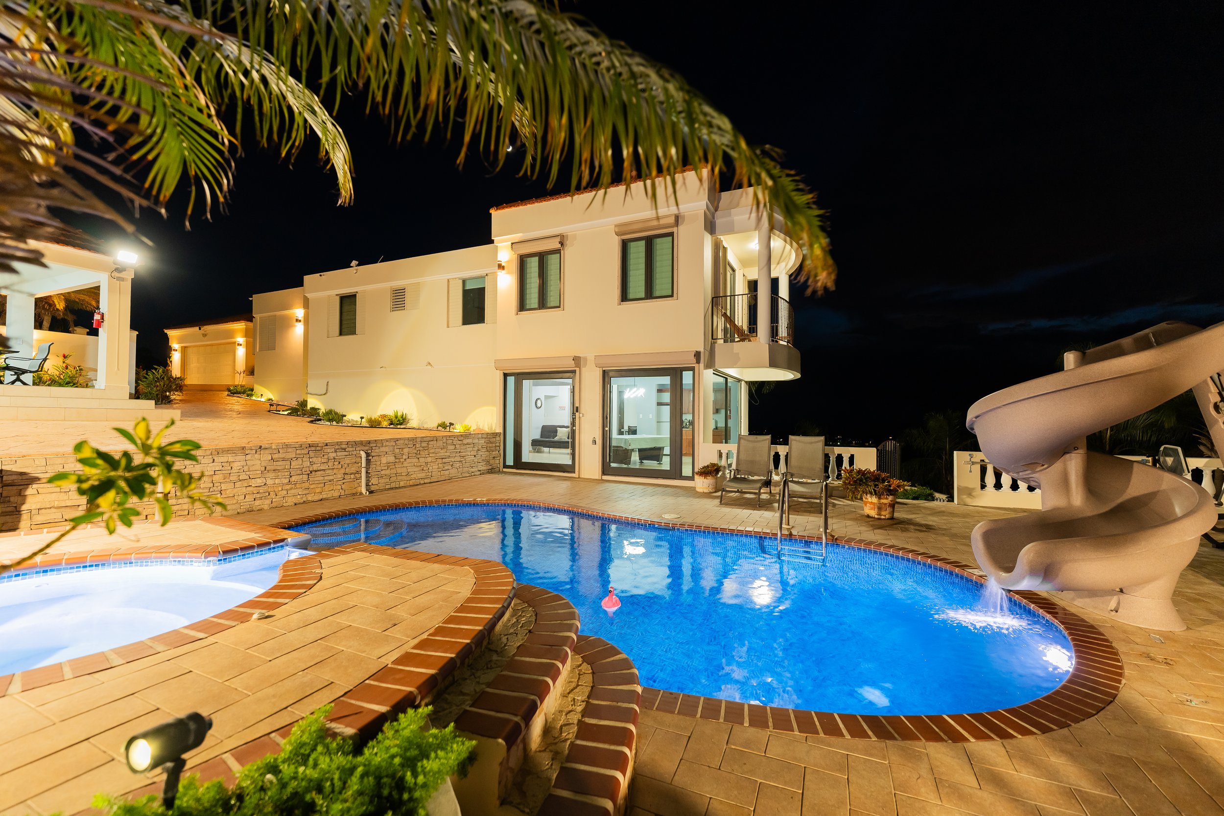 The pool glowing at dusk